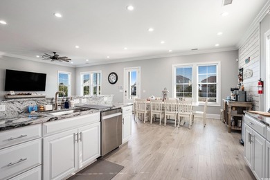 Welcome to 1203 N Ocean Blvd, a stunning 5-bedroom, 5.5-bath