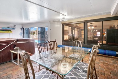 This home is an outdoor oasis in paradise located in an