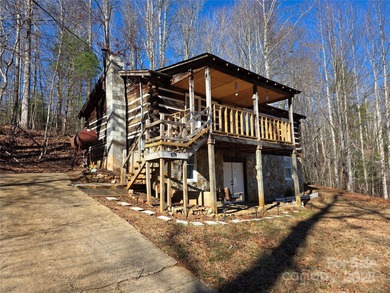 Charming Log Cabin Retreat with Creekfront Oasis Nestled just
