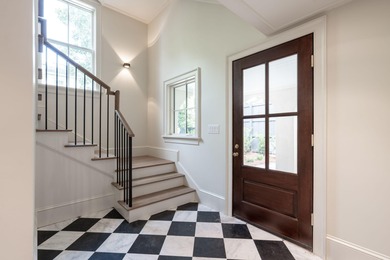Welcome to 4 Trapman Street -- a beautifully designed townhome