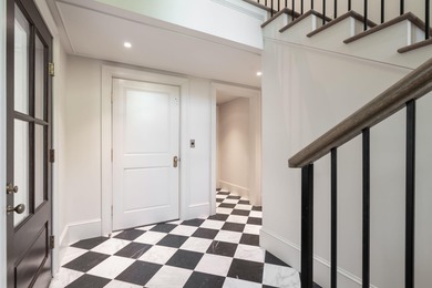 Welcome to 4 Trapman Street -- a beautifully designed townhome