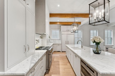 Welcome to 4 Trapman Street -- a beautifully designed townhome