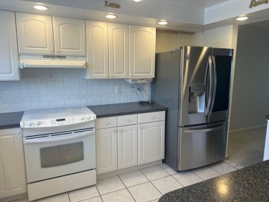 This charming 2-bedroom, 2-bathroom condo spans 963 square feet