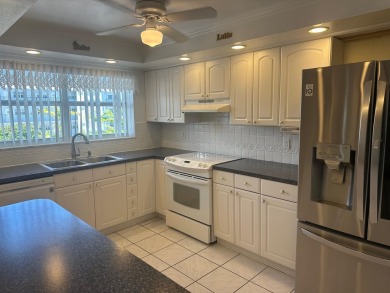 This charming 2-bedroom, 2-bathroom condo spans 963 square feet