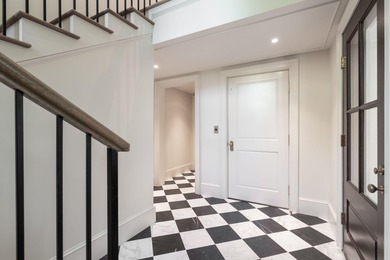 Welcome to 4 Trapman Street -- a beautifully designed townhome