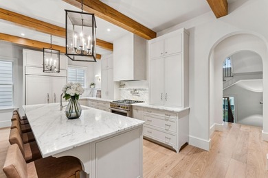 Welcome to 4 Trapman Street -- a beautifully designed townhome