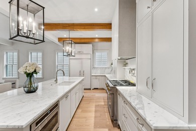 Welcome to 4 Trapman Street -- a beautifully designed townhome