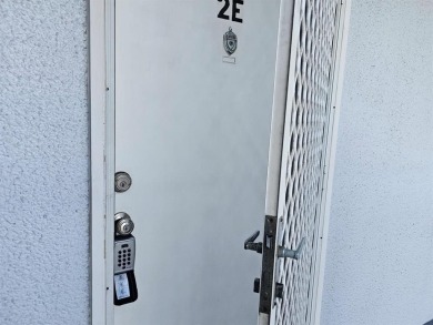 Beautiful 1BR/1.5BA condo with ceramic tile flooring in gated