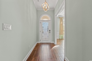 Come see this stunning custom built all brick home located in