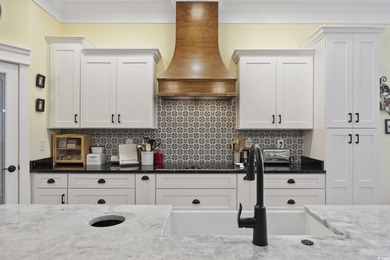 Experience the ease of single-level living in one of the rare