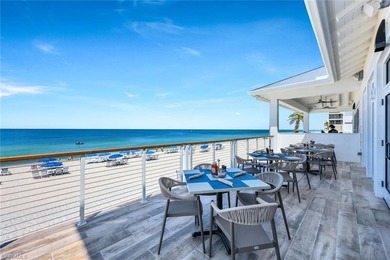 Set high above the treetops, this impressive 2nd-floor condo