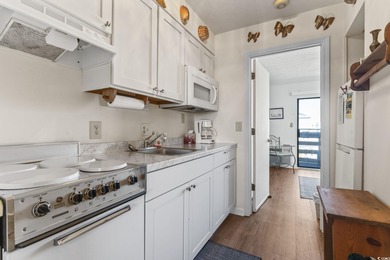 Welcome to Unit 209 at Guest House - a beautifully maintained