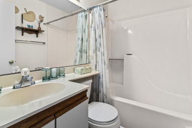 Welcome to Unit 209 at Guest House - a beautifully maintained