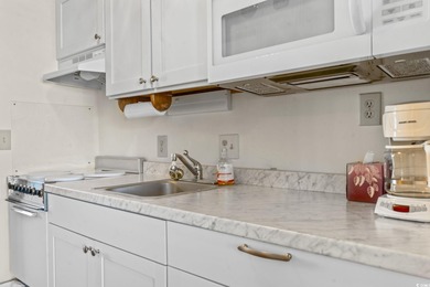 Welcome to Unit 209 at Guest House - a beautifully maintained