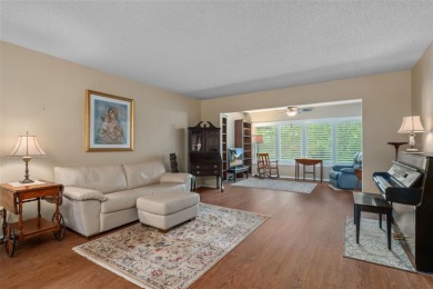 55+ Resort-style living in a beautifully maintained 2BR/2BA
