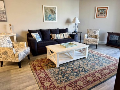 Discover beachside living at its finest with this beautifully