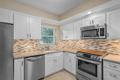 55+ Resort-style living in a beautifully maintained 2BR/2BA