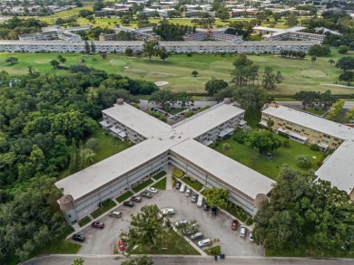 55+ Resort-style living in a beautifully maintained 2BR/2BA