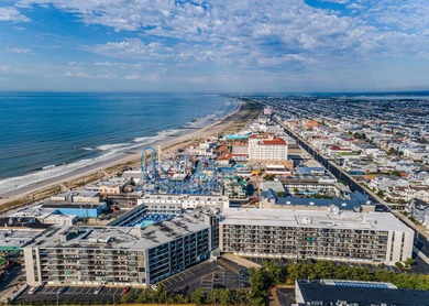 Discover beachside living at its finest with this beautifully