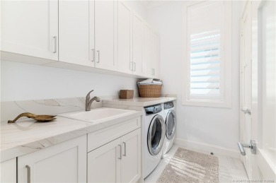 Experience coastal luxury and refined living in this stunning