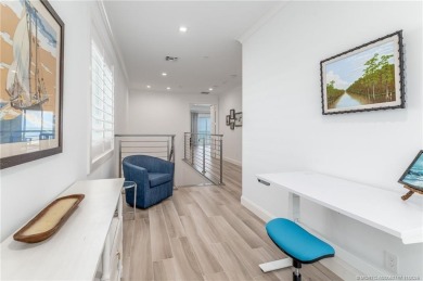 Experience coastal luxury and refined living in this stunning