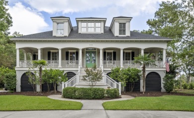 This Lowcountry Estate sits on a park-like private lot with