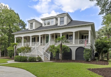 This Lowcountry Estate sits on a park-like private lot with