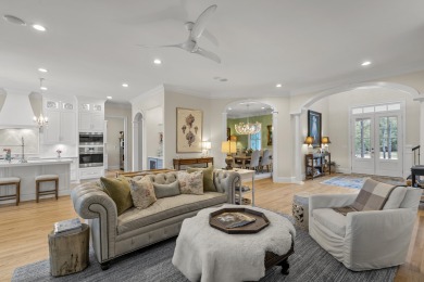 This Lowcountry Estate sits on a park-like private lot with