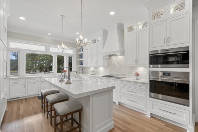 This Lowcountry Estate sits on a park-like private lot with