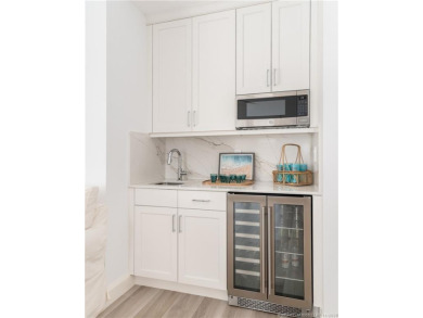 Experience coastal luxury and refined living in this stunning