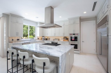 Timeless elegance in Palm Beach Polo & Country Club! This 6BD/6