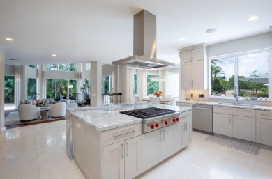 Timeless elegance in Palm Beach Polo & Country Club! This 6BD/6