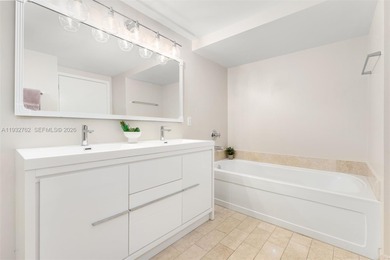 Discover a rarely available townhouse-style condo ideally