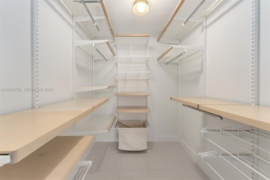 Discover a rarely available townhouse-style condo ideally