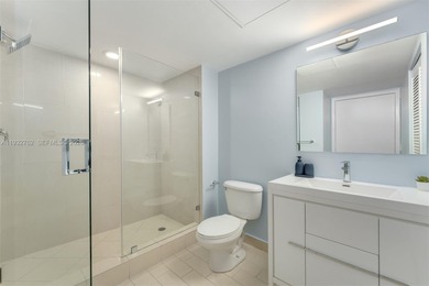 Discover a rarely available townhouse-style condo ideally