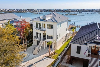 This stunning contemporary home on Murrells Inlet has 5-bedroom