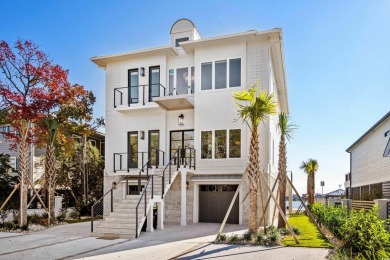 This stunning contemporary home on Murrells Inlet has 5-bedroom