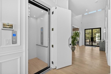 This stunning contemporary home on Murrells Inlet has 5-bedroom