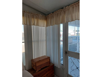 COME SEE THIS SPACIOUS WELL LAYED OUT HOME. ENTER THROUGH THE