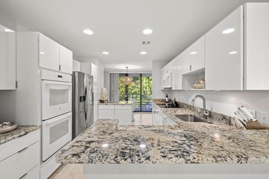 Seaside Retreat! This end-unit has been beautifully renovated &