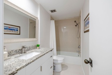 Seaside Retreat! This end-unit has been beautifully renovated &