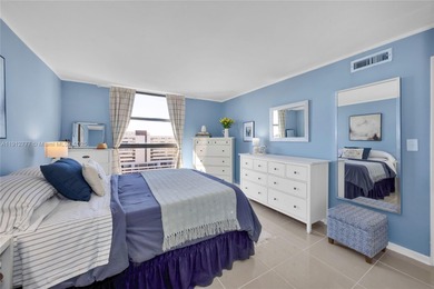 Experience Coral Gables living from this high-floor residence at