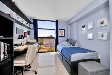 Experience Coral Gables living from this high-floor residence at