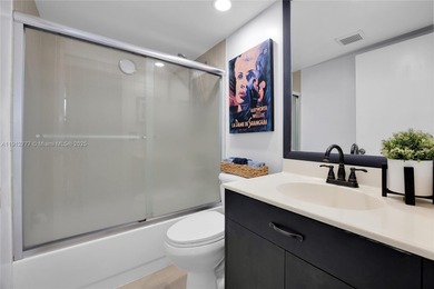 Experience Coral Gables living from this high-floor residence at