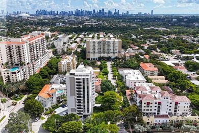 Experience Coral Gables living from this high-floor residence at