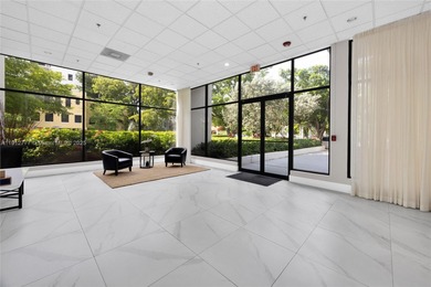 Experience Coral Gables living from this high-floor residence at
