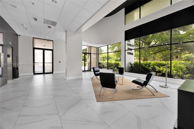 Experience Coral Gables living from this high-floor residence at