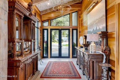 Welcome to 4103 and 4101 Sound Drive, featuring 5 bedrooms and 5