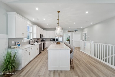 Oceanfront elegance meets coastal convenience in this stunning