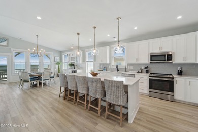 Oceanfront elegance meets coastal convenience in this stunning
